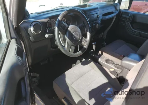 2011 Jeep Wrangler Sport z USA, uszkodzony, nr VIN 1J4AA2D16BL587493